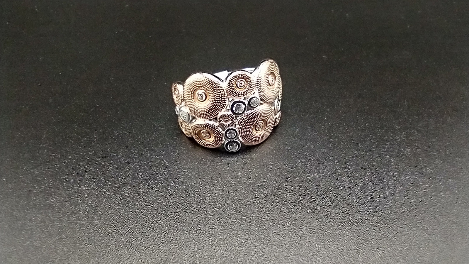 "GEARS" Rose gold/topaz & 925 sterling silver ring size 8....$75.