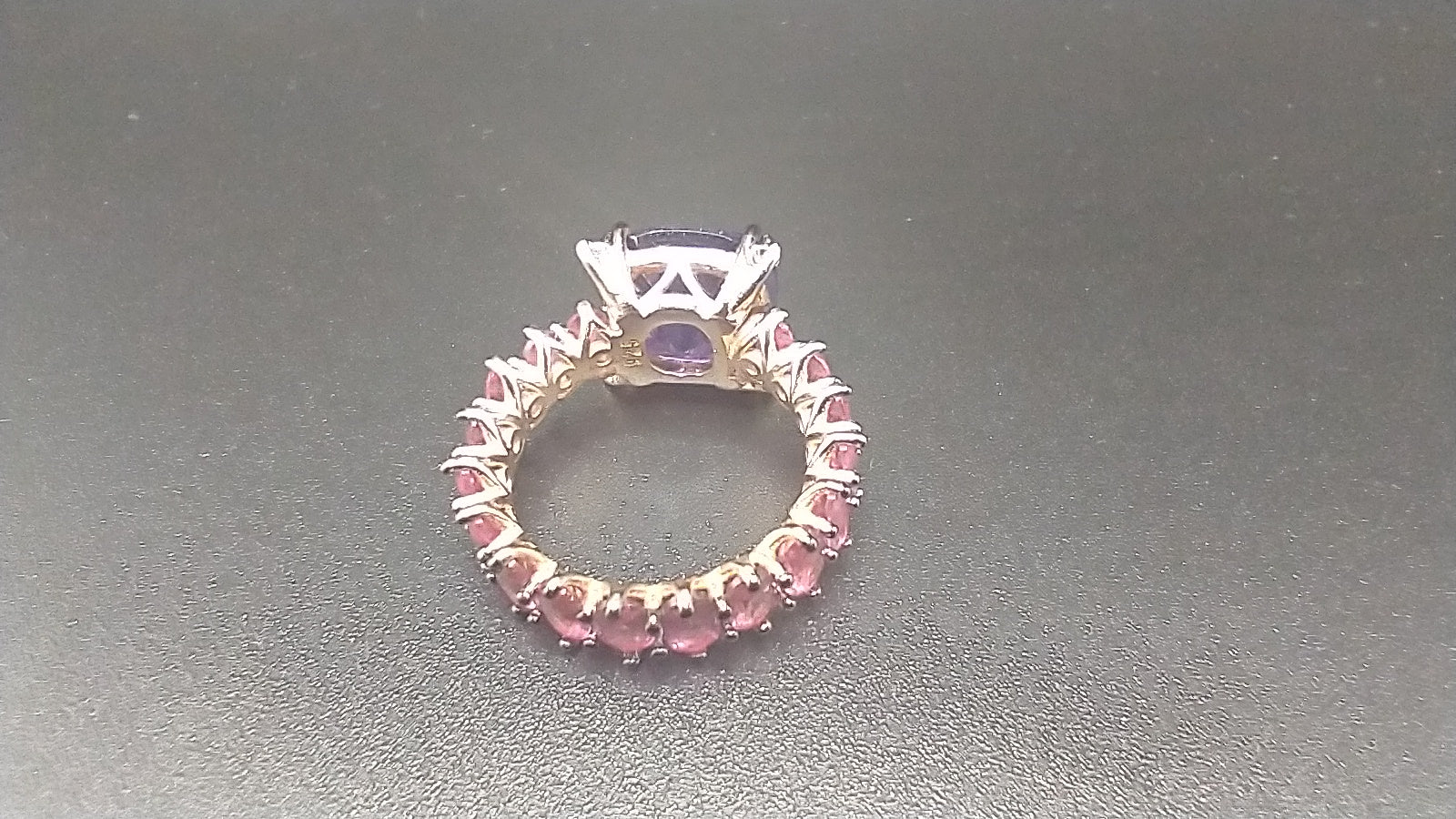 "PURPLE MENAGERIE"Pink/Purple topaz stones rose gold on 925 sterling silver ring size 7...$60.