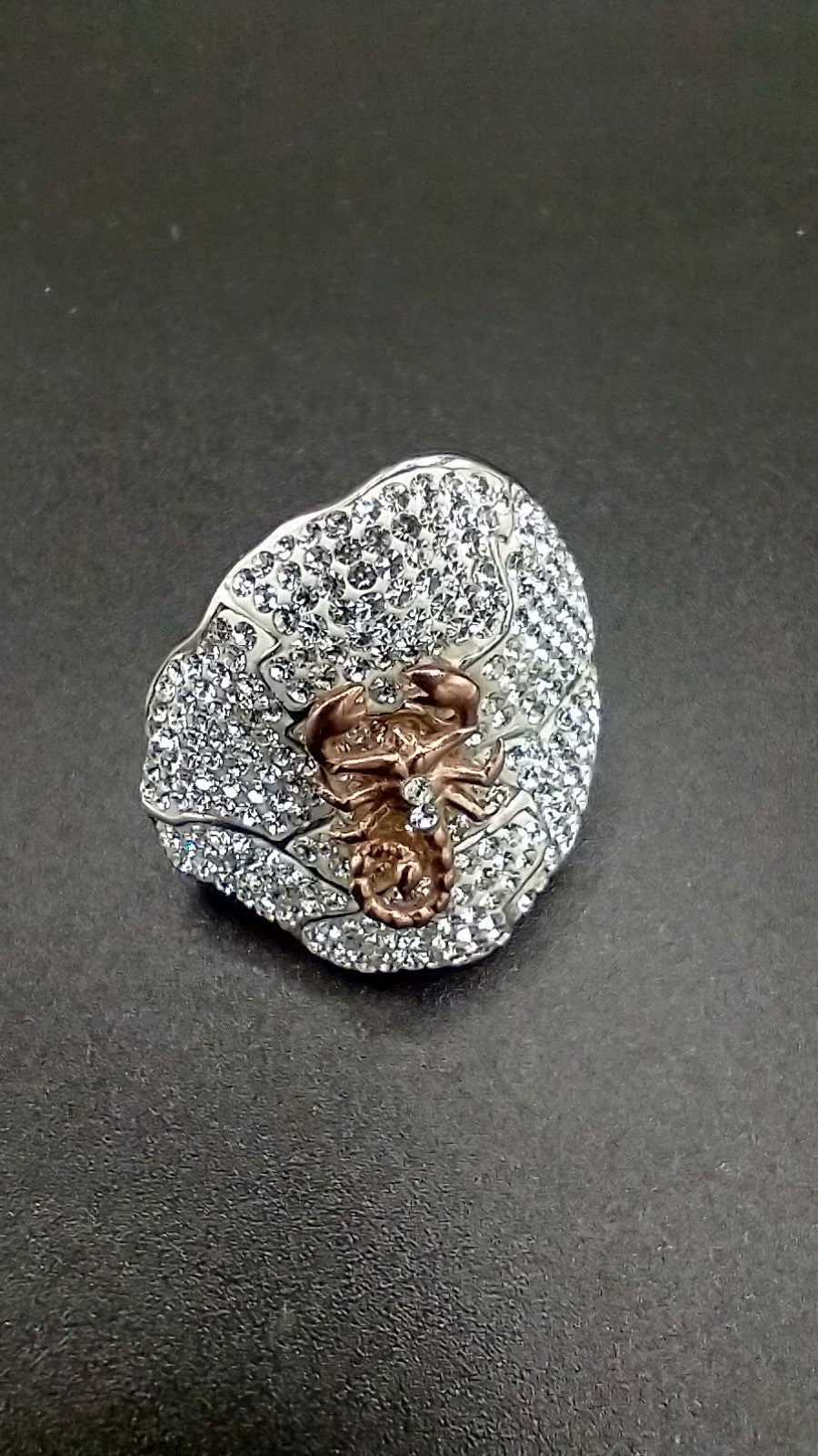 "SCORPION ON WHITE SAND" White sapphire on 925 sterling silver ring size 9...$130.