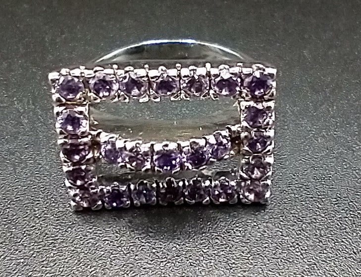 "SYNOPSIS" Amethyst stones on 925 sterling silver ring size 8.....$65.